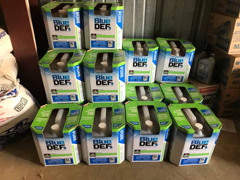 Assortment of BLUE DEF diesel fluid, available at Fitterer Gas & Oil in Flasher, ND
